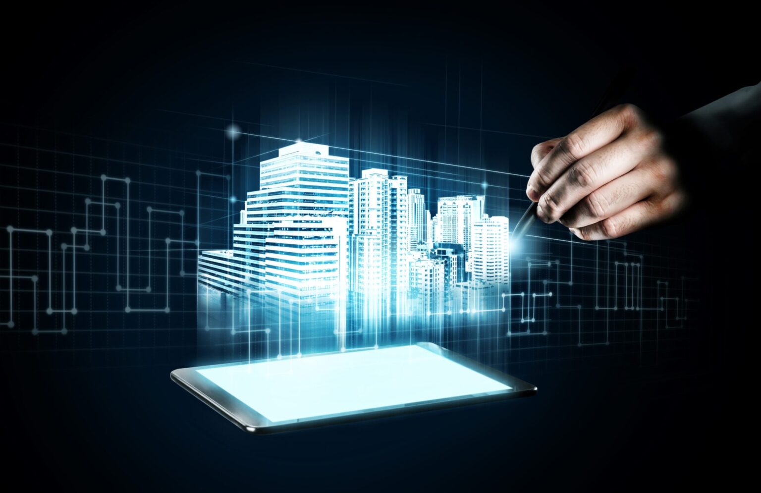 Model digital luminos al unor clădiri, deasupra unei tablete, atins cu un stylus